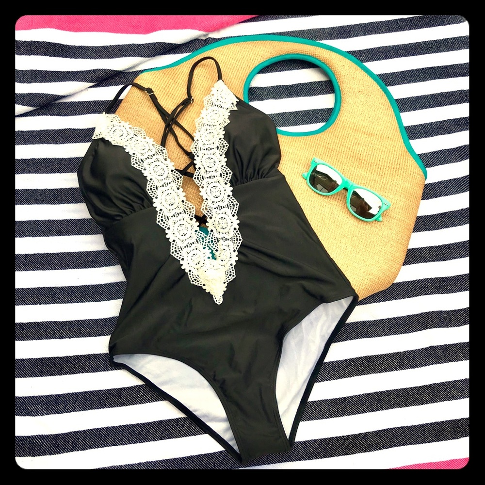 Black one-piece swimsuit with ivory lace